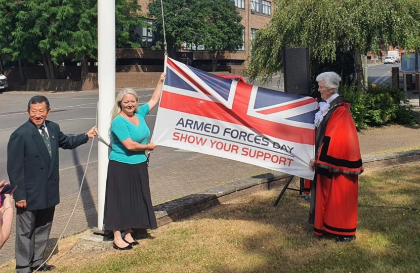 Pictured, the Armed Forces flag raising service held at Surrey Heath House, Camberley