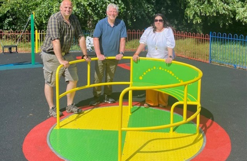 Pictured, Cllr James Harris, Cllr Katia Malcaus Cooper, and Cllr Alf Turner at the new playground on Lightwater recreation ground