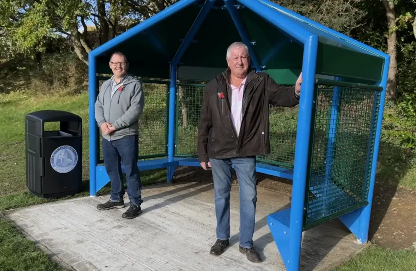 Pictured, Cllr John Tonks and Cllr Nigel Manning at the new shelter on Ash Recreation Ground