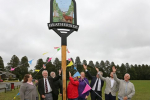 Pictured, the unveiling ceremony of the Community Pillar in Heatherside