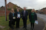 Pictured, Michael Gove MP with staff from Accent Housing