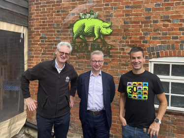 Pictured, Michael Gove MP at Hogs Back Brewery with Rupert Thompson, Managing Director