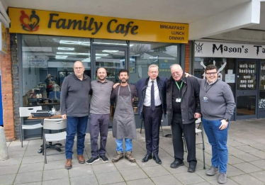 Pictured, Michael Gove MP with Cllrs Lewis Mears, Trefor Hogg and Shaun Garrett, alongside owners of the Family Cafe, Dean Parade
